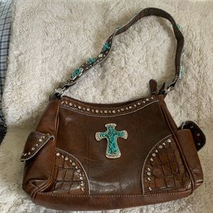 Leather embellished bag